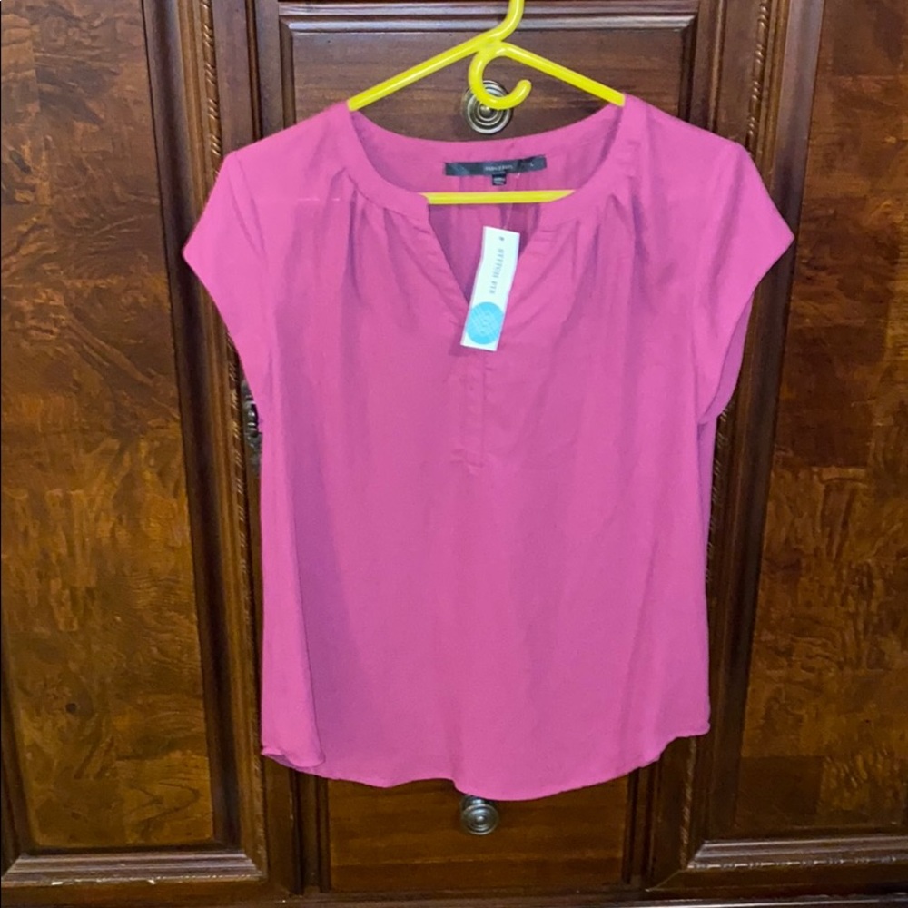 Berry colored short sleeve blouse. Never worn NWT
